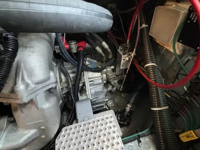 Morning Star V Yacht Photos Pics Engine compartment of a 1997 Albin 31 Tournament boat, showcasing mechanical components and wiring.