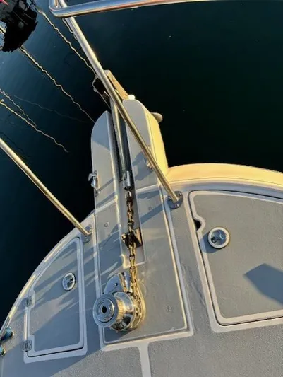 Morning Star V Yacht Photos Pics 1997 Albin 31 Tournament boat deck with anchor chain and winch.