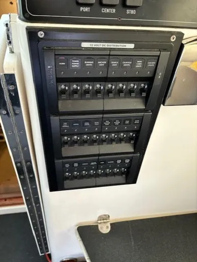 Morning Star V Yacht Photos Pics Electrical panel on a 1997 Albin 31 Tournament boat, featuring multiple switches and controls.
