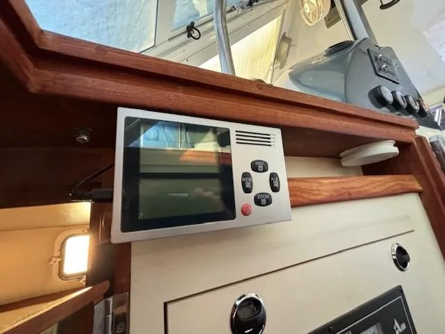 Morning Star V Yacht Photos Pics Control panel inside a 1997 Albin 31 Tournament boat cabin.