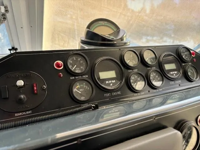 Morning Star V Yacht Photos Pics Control panel of a 1997 Albin 31 Tournament boat with gauges and dials.