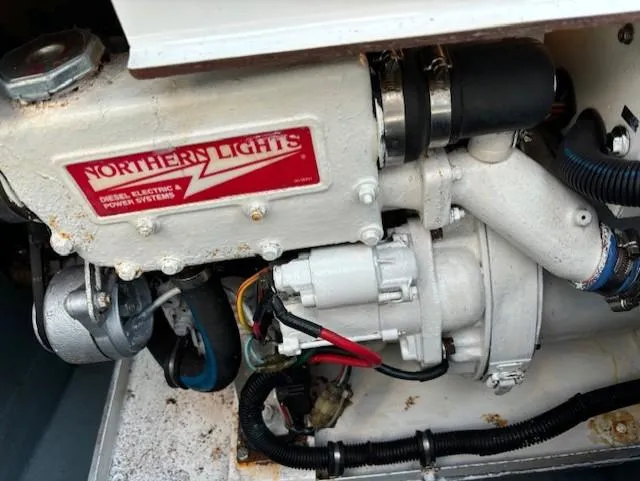 Morning Star V Yacht Photos Pics Engine compartment of a 1997 Albin 31 Tournament with Northern Lights diesel generator.