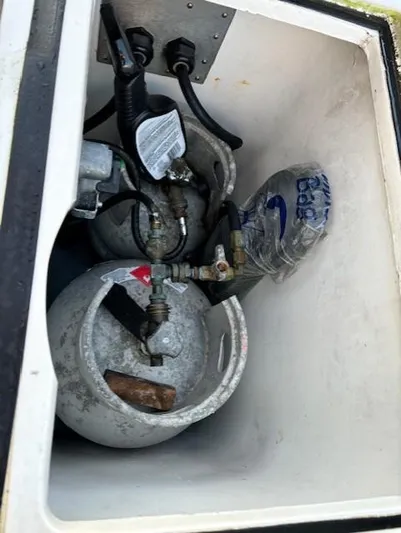 Morning Star V Yacht Photos Pics Propane tanks and equipment in storage compartment of 1997 Albin 31 Tournament boat.