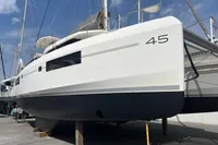 2018 Leopard 45 catamaran on dry dock, showcasing sleek design and modern features.