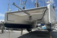 2018 Leopard 45 catamaran on dry dock, showcasing hull and rigging details.