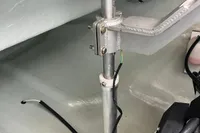 Metal support structure inside a 2018 Leopard 45 boat, featuring wiring and bolts.