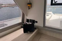 Interior of 2018 Leopard 45 yacht with navigation equipment and ocean view.