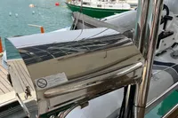 Stainless steel grill on a 2018 Leopard 45 yacht, docked by the water.