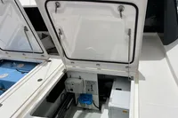 Open hatch on 2018 Leopard 45 yacht, revealing interior equipment and storage.