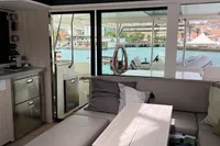 Interior of 2018 Leopard 45 yacht with modern kitchen and marina view.