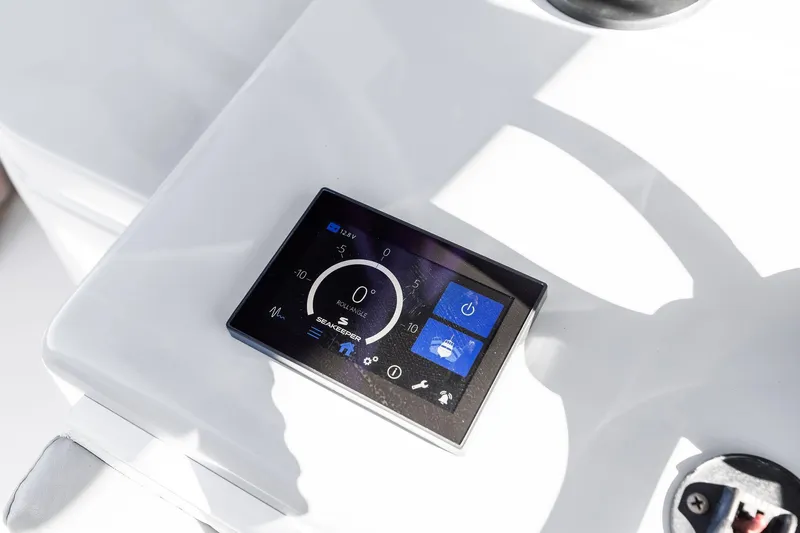  Yacht Photos Pics Control panel on 2022 Contender 44 CB boat, displaying Seakeeper stabilization system.