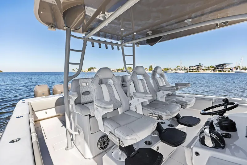  Yacht Photos Pics Contender 44 CB 2022 boat interior with luxurious seating and ocean view.