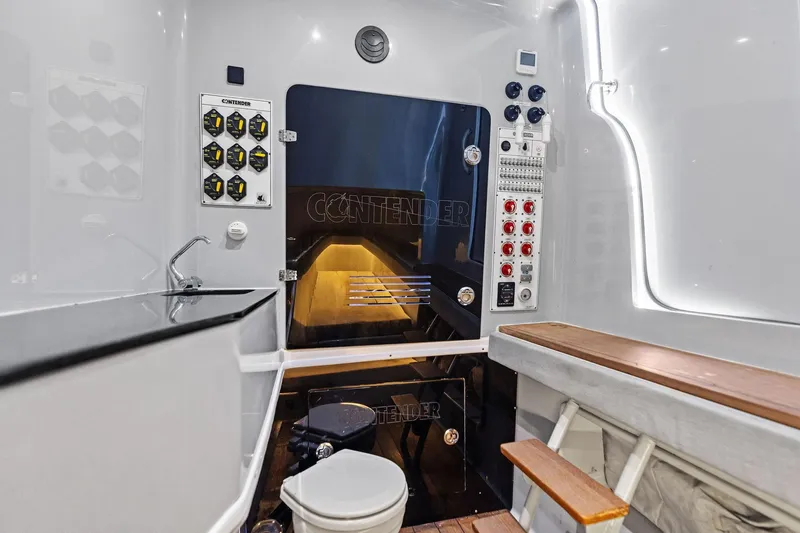  Yacht Photos Pics 2022 Contender 44 CB boat interior with control panels, seating, and modern amenities.