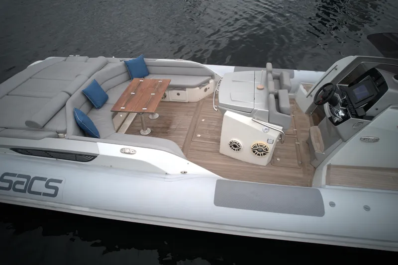  Yacht Photos Pics 2014 SACS Strider 13 luxury inflatable boat with spacious seating and modern amenities.