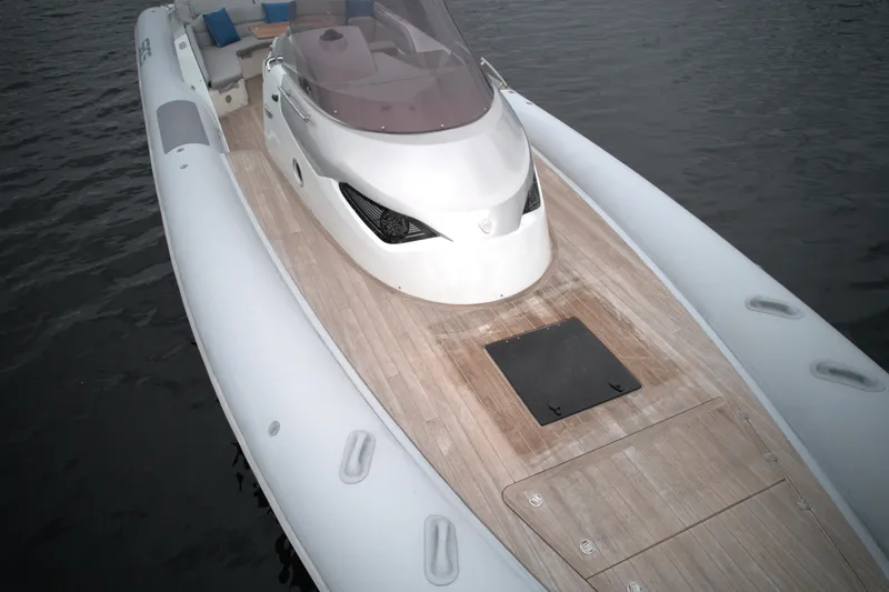  Yacht Photos Pics 2014 SACS Strider 13 luxury inflatable boat on water.