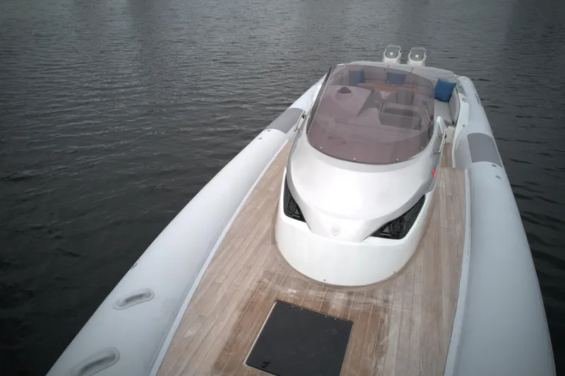  Yacht Photos Pics 2014 SACS Strider 13 luxury inflatable boat on calm water.