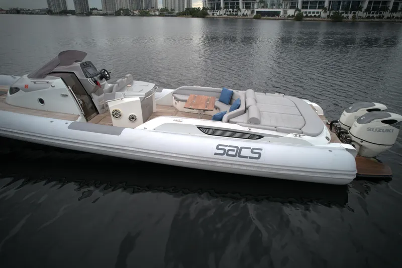  Yacht Photos Pics 2014 SACS Strider 13 luxury inflatable boat on calm water.