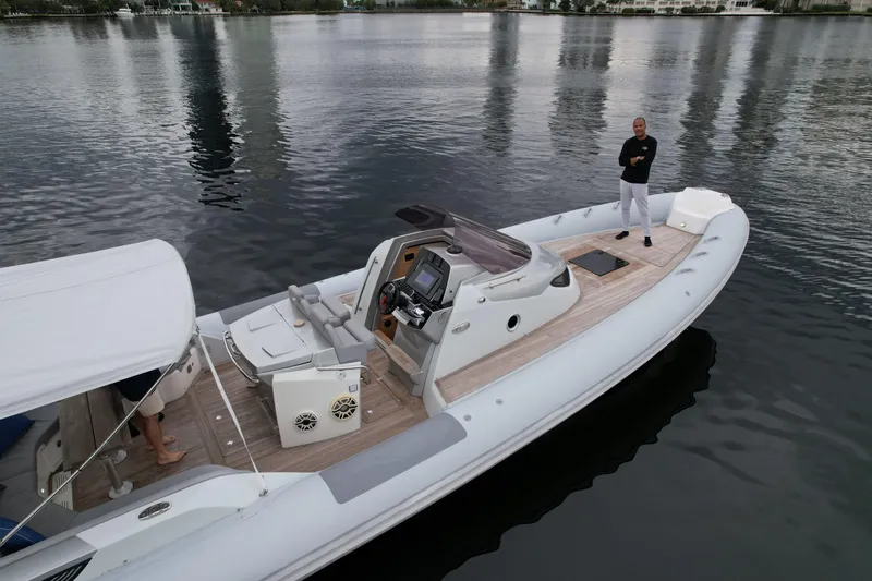  Yacht Photos Pics 2014 SACS Strider 13 luxury inflatable boat on calm water.