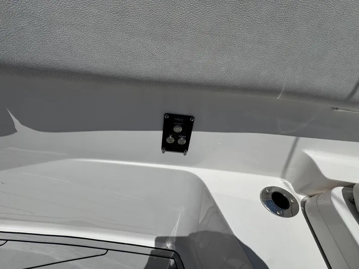  Yacht Photos Pics 2023 Sea Fox 368 Commander boat interior with control panel and cup holder.