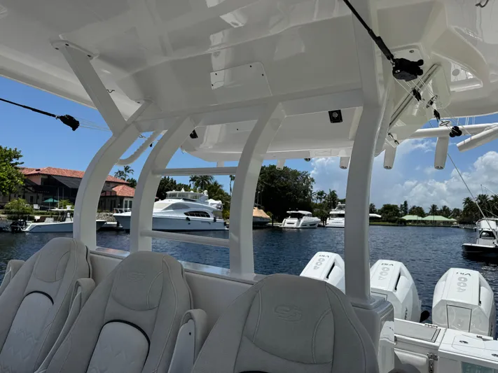  Yacht Photos Pics 2023 Sea Fox 368 Commander interior with luxurious seating and waterfront view.