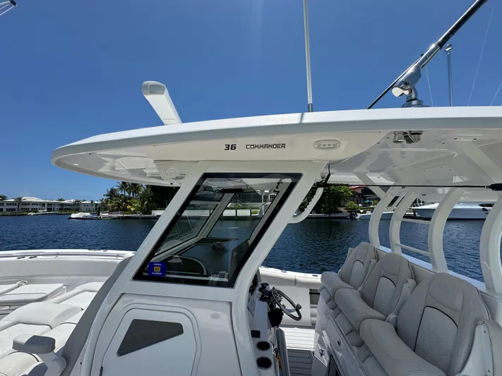  Yacht Photos Pics 2023 Sea Fox 368 Commander boat interior with seating, helm, and water view.