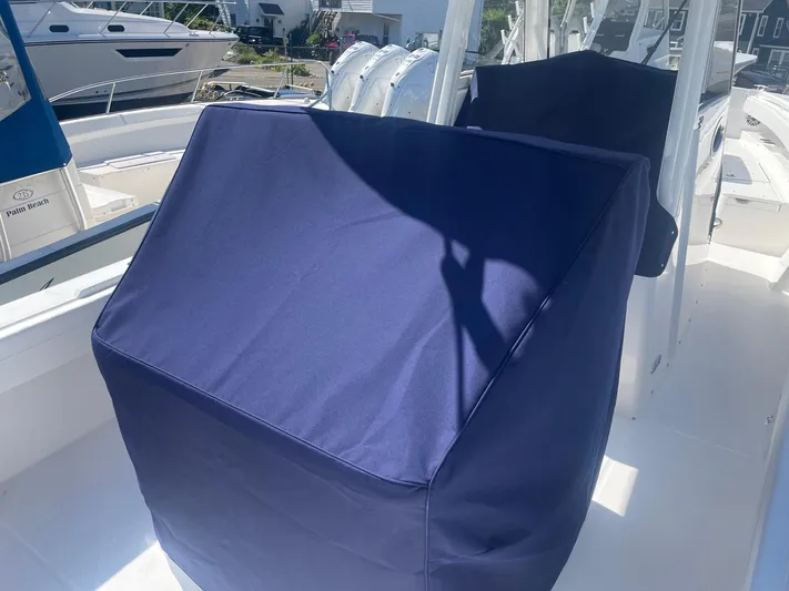  Yacht Photos Pics Covered helm station on a 2025 Regulator 31 boat.