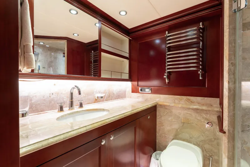 Beothuk Yacht Photos Pics Luxurious yacht bathroom with marble countertop, wooden cabinetry, and modern fixtures, 2008 Kuipers Woudsend Doggersbank Offshore.