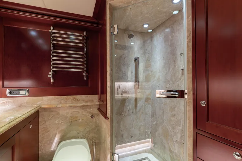 Beothuk Yacht Photos Pics Luxurious yacht bathroom with marble shower, wooden cabinetry, and heated towel rack, Kuipers Woudsend 2008.