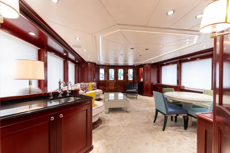 Beothuk Yacht Photos Pics Luxurious yacht interior with elegant wood paneling, modern furnishings, and ambient lighting, 2008 Doggersbank Offshore.