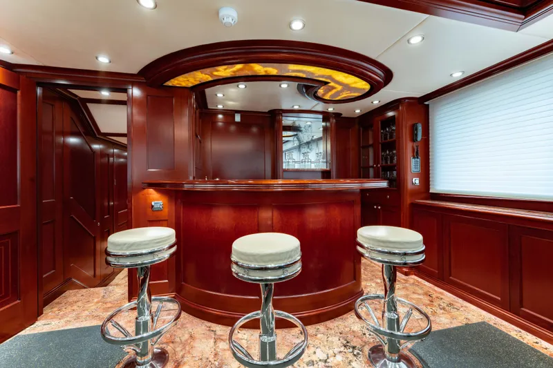 Beothuk Yacht Photos Pics Luxurious yacht interior with elegant wooden bar and modern stools, Kuipers Woudsend Doggersbank Offshore 2008.