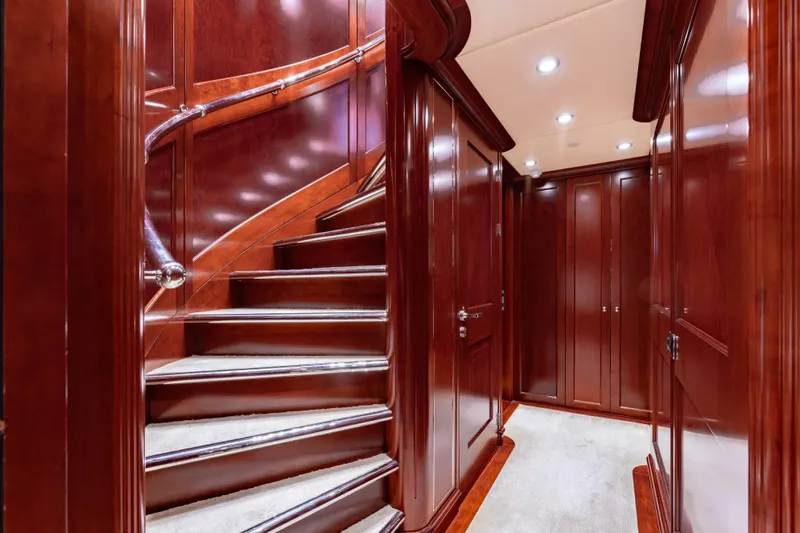 Beothuk Yacht Photos Pics Luxurious wooden staircase and hallway inside 2008 Kuipers Woudsend Doggersbank Offshore yacht.