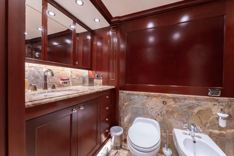 Beothuk Yacht Photos Pics Luxurious yacht bathroom with marble accents and rich wood cabinetry, Kuipers Woudsend Doggersbank Offshore 2008.