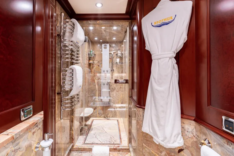 Beothuk Yacht Photos Pics Luxurious yacht bathroom with marble shower, towel rack, and robe; Kuipers Woudsend Doggersbank Offshore 2008.