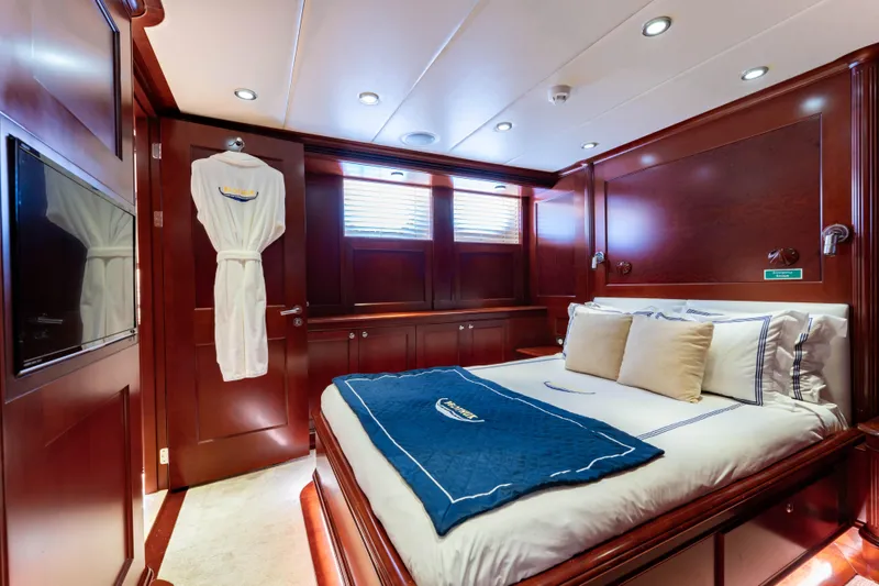 Beothuk Yacht Photos Pics Luxurious cabin interior of 2008 Kuipers Woudsend Doggersbank Offshore yacht with elegant wood finish.