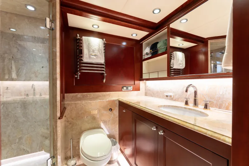 Beothuk Yacht Photos Pics Luxurious yacht bathroom with marble accents, wooden cabinetry, and modern fixtures, 2008 Doggersbank Offshore.