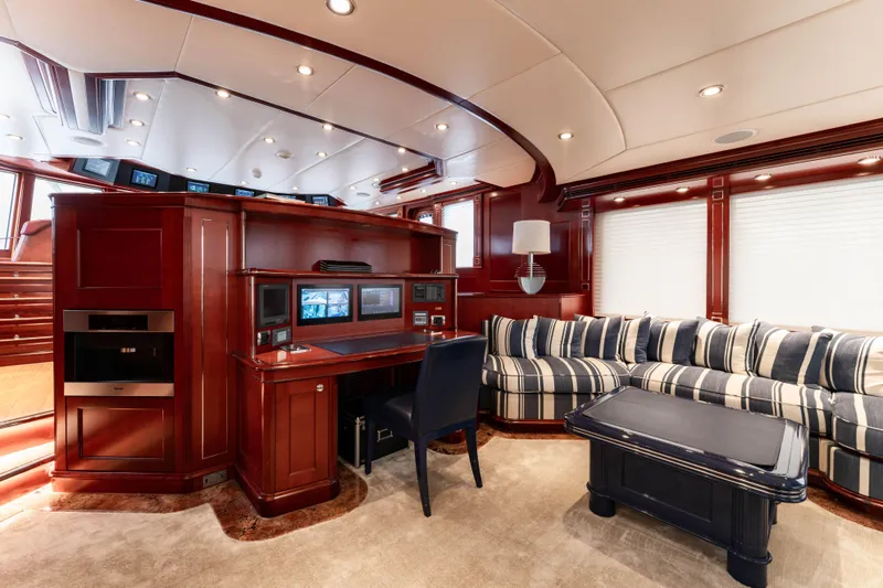 Beothuk Yacht Photos Pics Luxurious interior of 2008 Kuipers Woudsend Doggersbank Offshore yacht with elegant wood finishes.