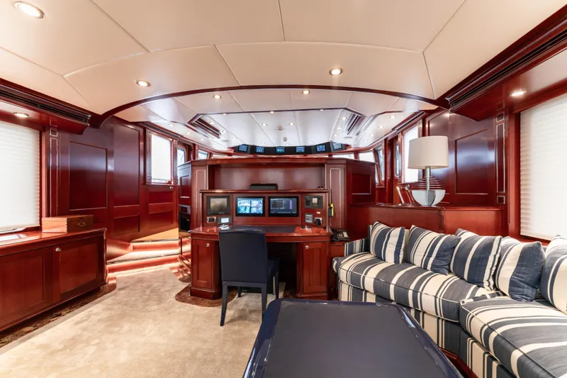 Beothuk Yacht Photos Pics Luxurious interior of 2008 Kuipers Woudsend Doggersbank Offshore yacht with elegant wood paneling.