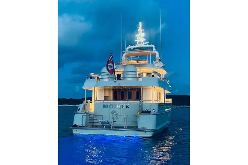 Beothuk Yacht Photos Pics Luxurious 2008 Kuipers Woudsend Doggersbank Offshore yacht illuminated at night on the water.