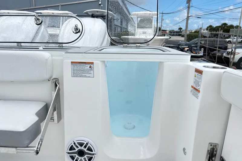  Yacht Photos Pics 2026 Sea Fox 328 Commander boat interior with seating and storage compartment.