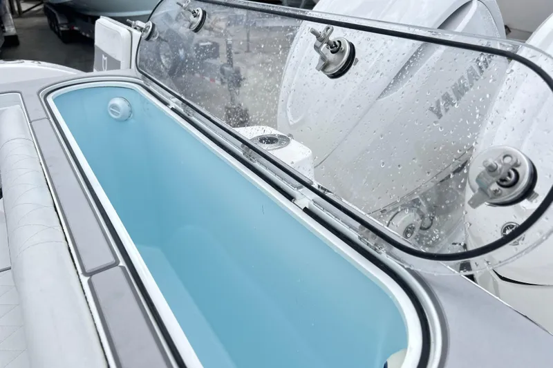  Yacht Photos Pics Livewell on 2026 Sea Fox 328 Commander boat with Yamaha engines in background.