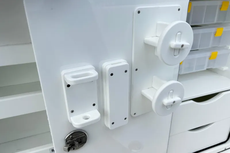 Yacht Photos Pics Close-up of 2026 Sea Fox 328 Commander boat storage compartment with secure locking mechanisms.