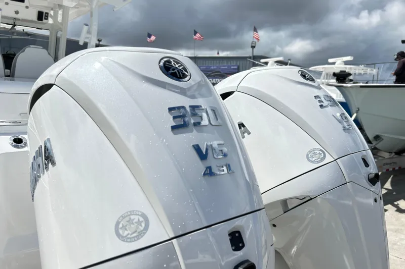  Yacht Photos Pics 2026 Sea Fox 328 Commander with Yamaha 350 V6 engines, under cloudy sky.