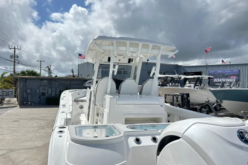  Yacht Photos Pics 2026 Sea Fox 328 Commander boat displayed outdoors under cloudy sky.