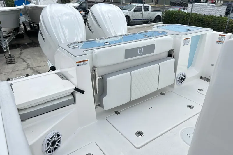  Yacht Photos Pics 2026 Sea Fox 328 Commander boat interior with Yamaha engines and seating area.