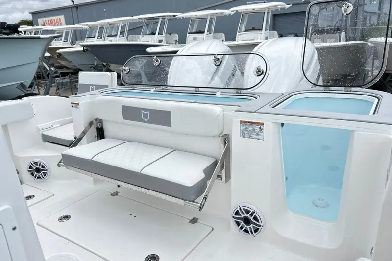  Yacht Photos Pics 2026 Sea Fox 328 Commander boat interior with seating and storage compartments.
