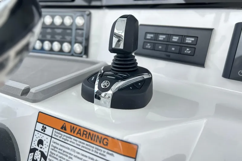  Yacht Photos Pics Control panel of 2026 Sea Fox 328 Commander boat with joystick and warning label.