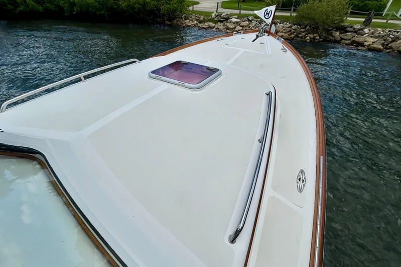 Clarity Yacht Photos Pics 2006 Hinckley 36 EP Picnic Boat deck view with hatch and railing.