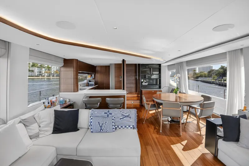  Yacht Photos Pics Luxurious interior of 2022 Princess Y85 yacht with modern furnishings and scenic water views.