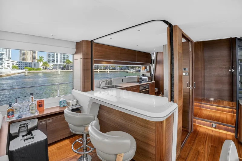  Yacht Photos Pics Luxurious 2022 Princess Y85 yacht interior with modern kitchen and waterfront view.