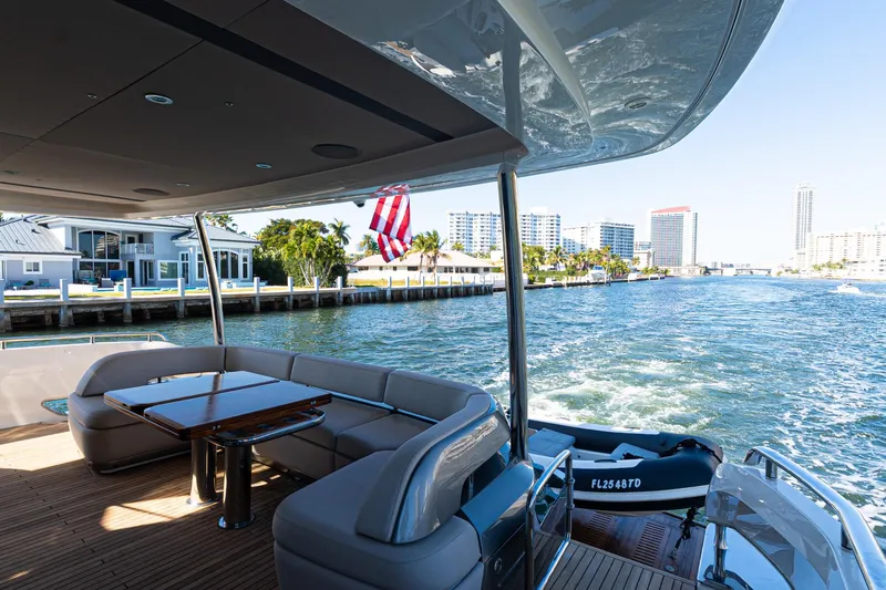  Yacht Photos Pics Luxurious 2022 Princess Y85 yacht cruising with scenic waterfront views.